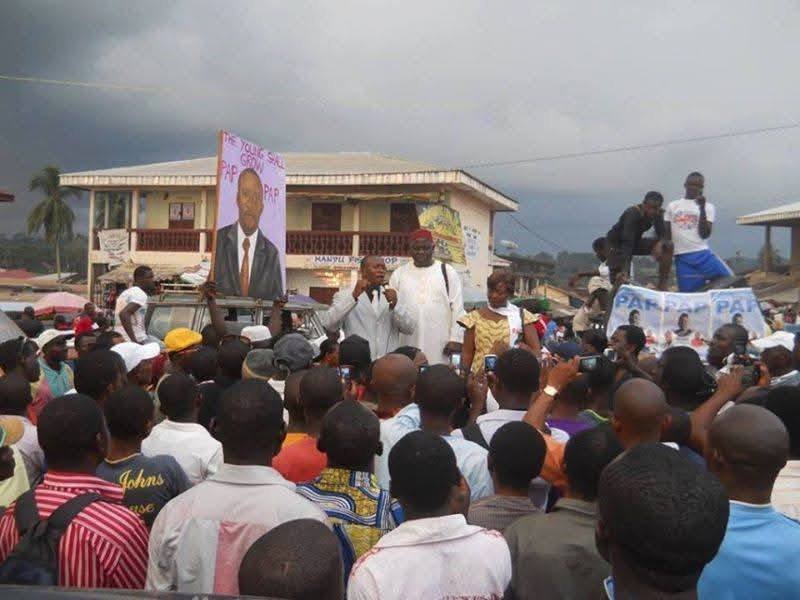 Akotarh Akoson (Raymond Akoson) addressing a large crowd at a PAP campaign rally in Cameroon